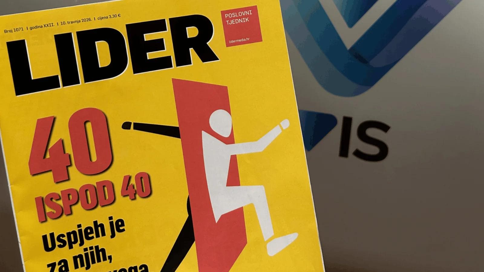 Lider media magazine with VIS company logo in the background.