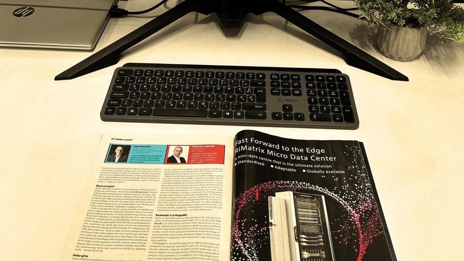 A desk set up with Lider media magazine and Miljenko Vuković commentary.